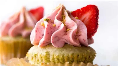 Pistachio Cupcakes with Strawberry Frosting